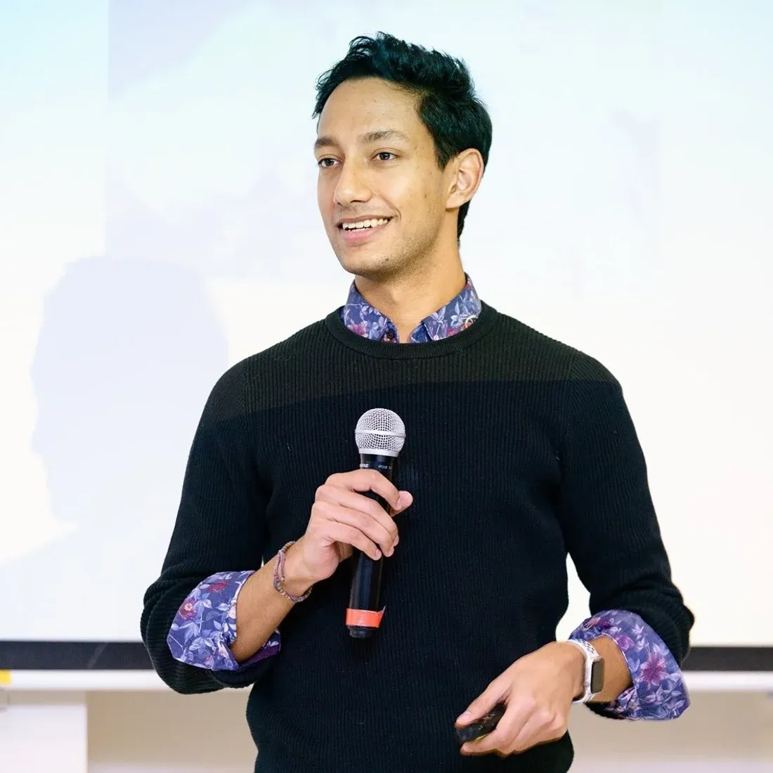Daniel Johnson speaking on stage